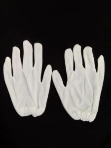 white cotton hosiery hand gloves