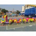 12 persons children park joy trains